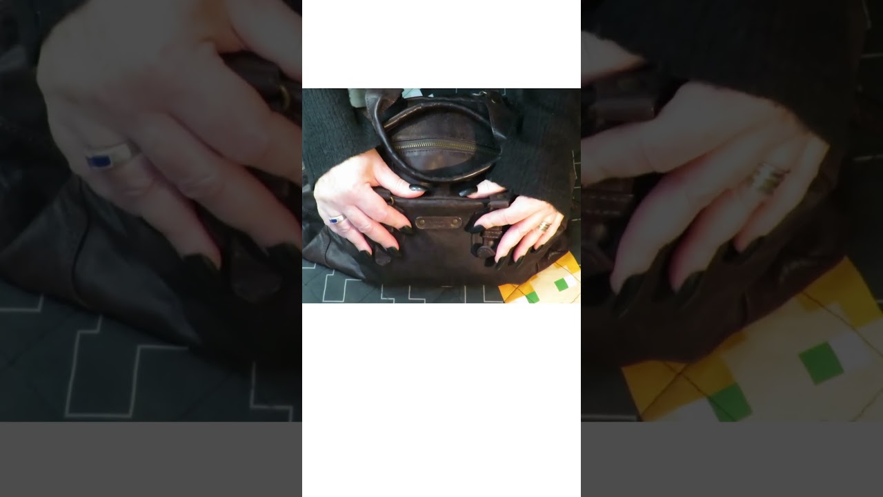 ASMR gently squeezing my leather bag #asmr #shorts #oddlysatisfying #leatherbag #whispering