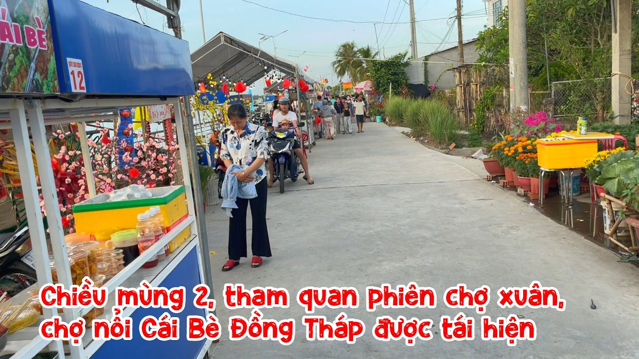 Chiều mùng 2 Tết 2026, tham quan phiên chợ xuân, xem chợ nổi Cái Bè được tái hiện dưới sông 