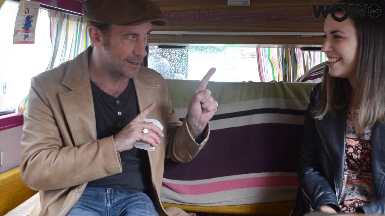 Paul Zenon performs a card trick in the #WOWwagon