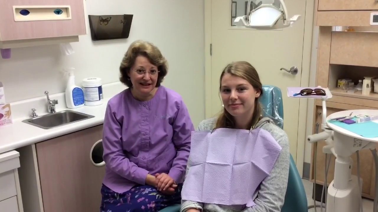 How to Floss and Brush With Bonded Retainers