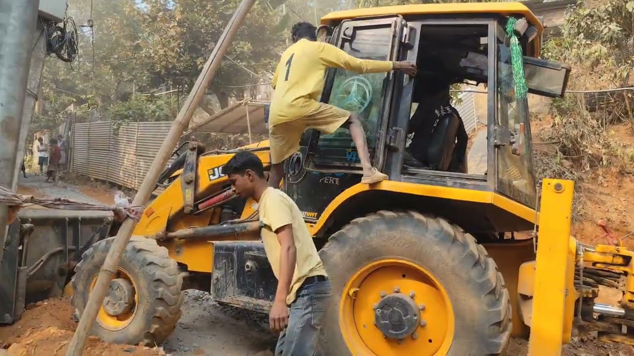#JCB 3DX backhoe loader commonly known as a JCB, involved in construction work video #