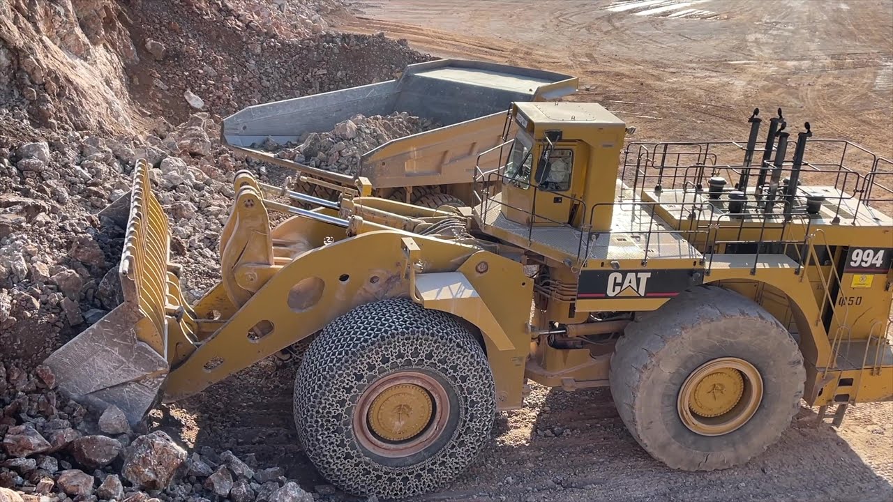 Huge Caterpillar 994/ 230 Tons Wheel Loader Loading Caterpillar 777F Dumpers - Samaras Mining Group