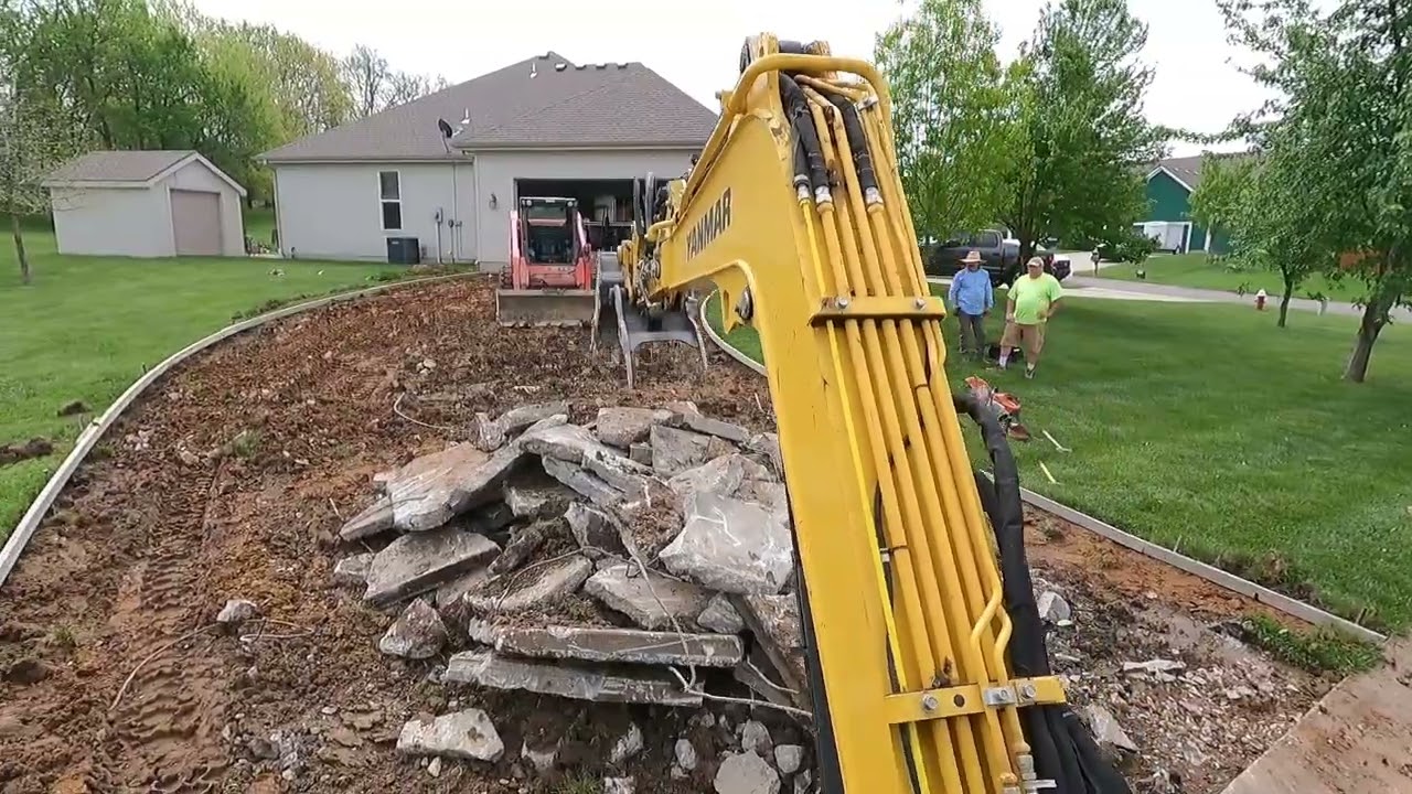 Tearing Out A Concrete Driveway With A Mini X