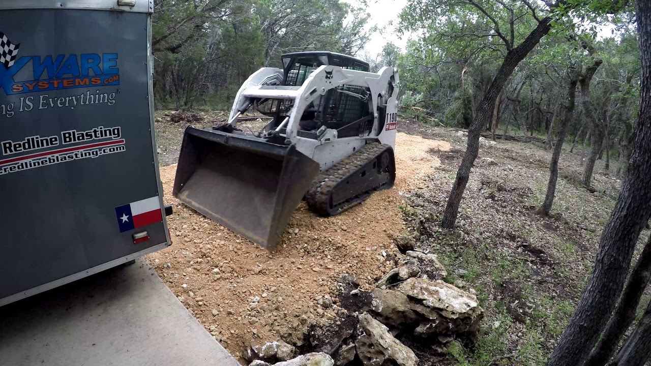 Container build - road fill and containers...bobcat fun.