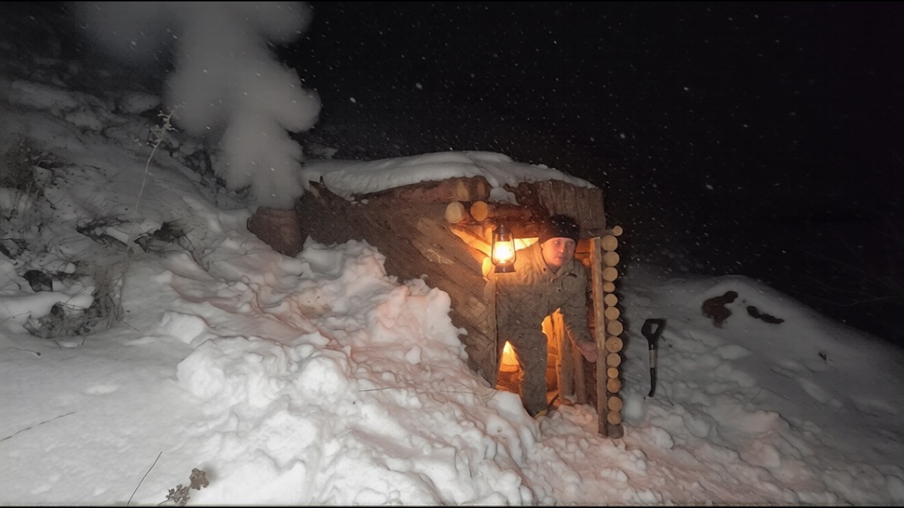 Building a winter shelter in the ground using clay and sticks, bushcraft survival