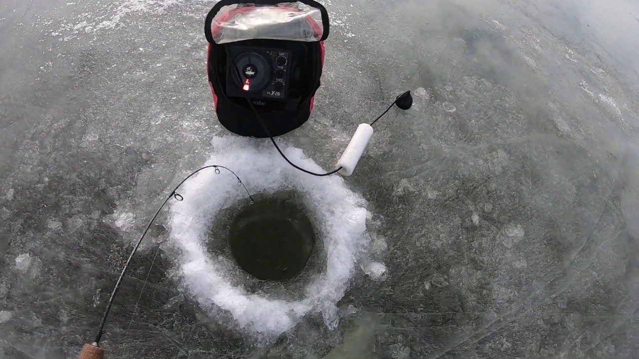 ice fishing in windy conditions, Jackson lake Colorado