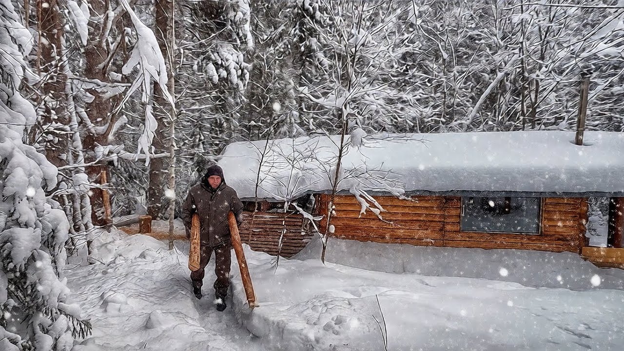 Wild Snow Camping at the end of the outgoing Year in a Log Cabin