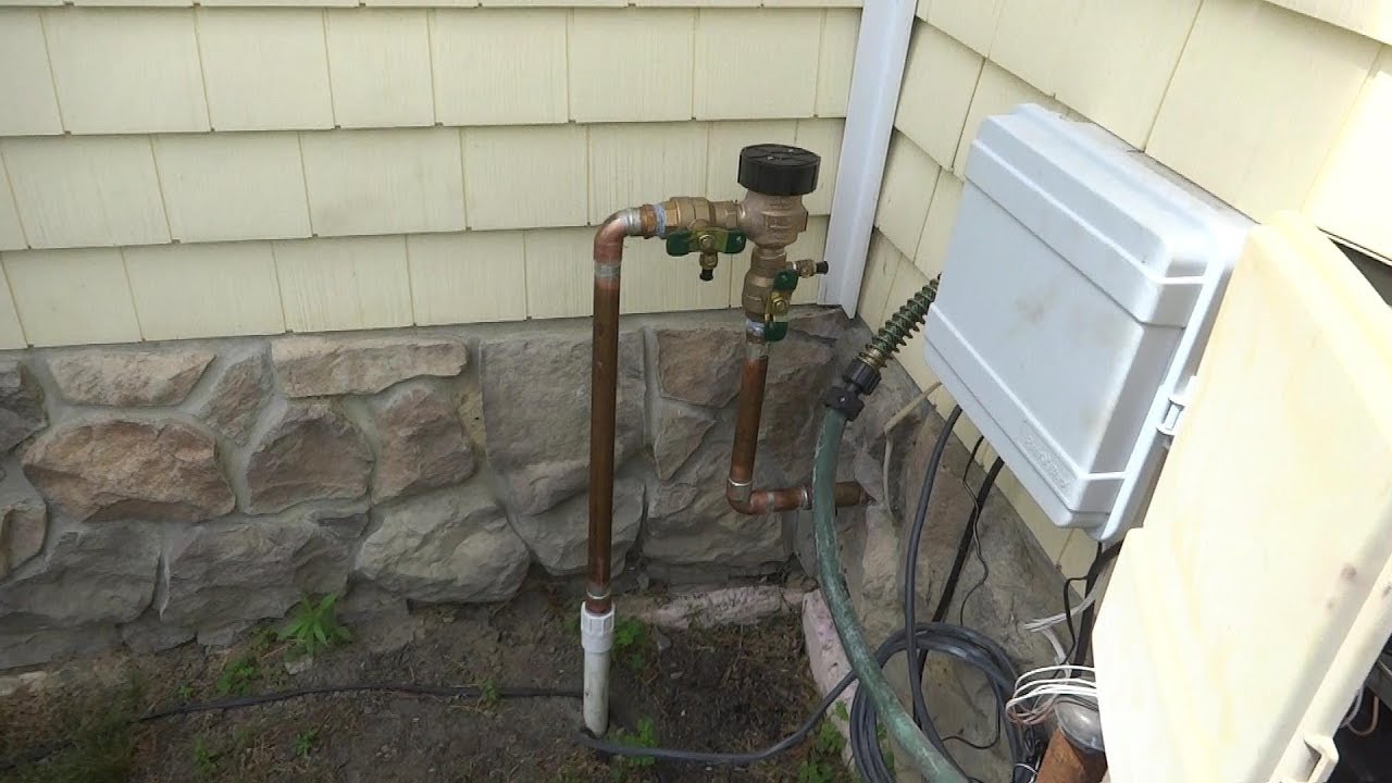 lawn sprinkler backflow preventer replaced