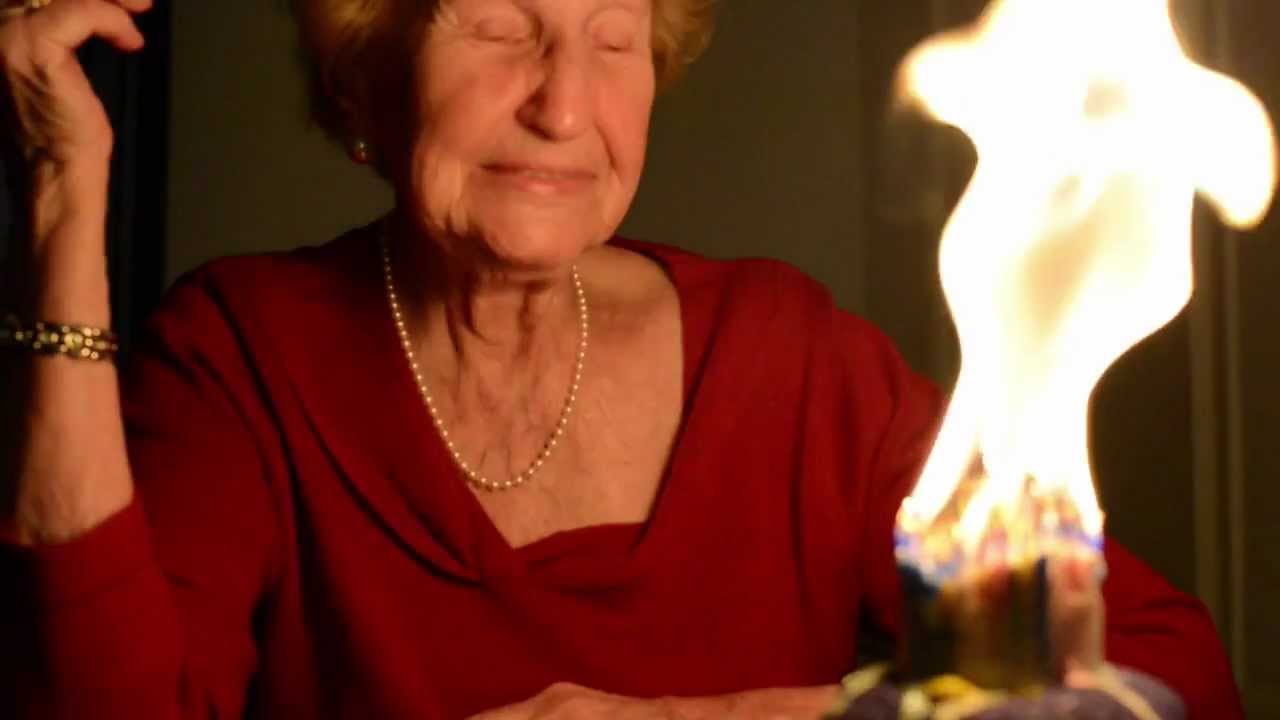 Grandma tries to blow out 90 birthday candles