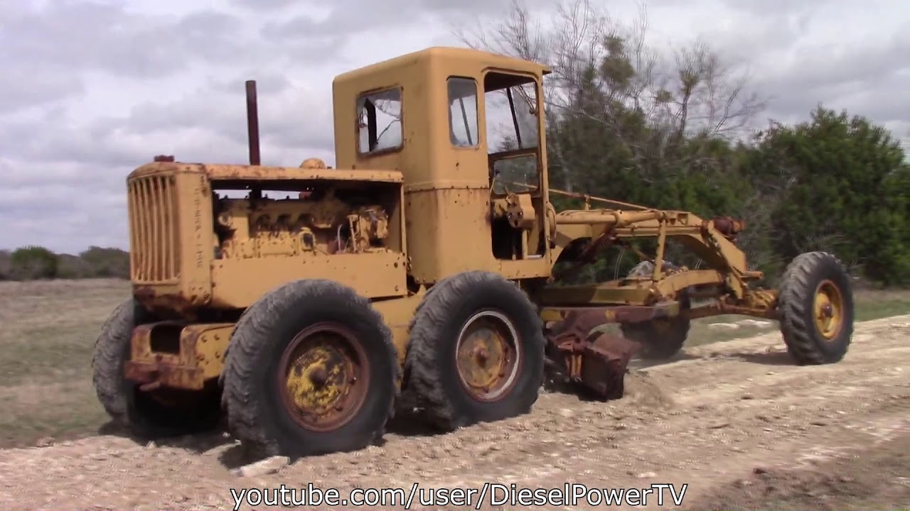 CAT 12 MOTOR GRADER GRADING ROAD!!!