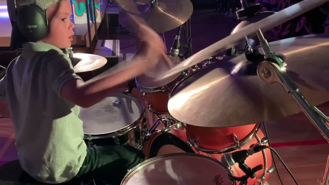 8-Year-Old Drummer Rocks Bon Jovi's 'You Give Love a Bad Name' in First School Performance!