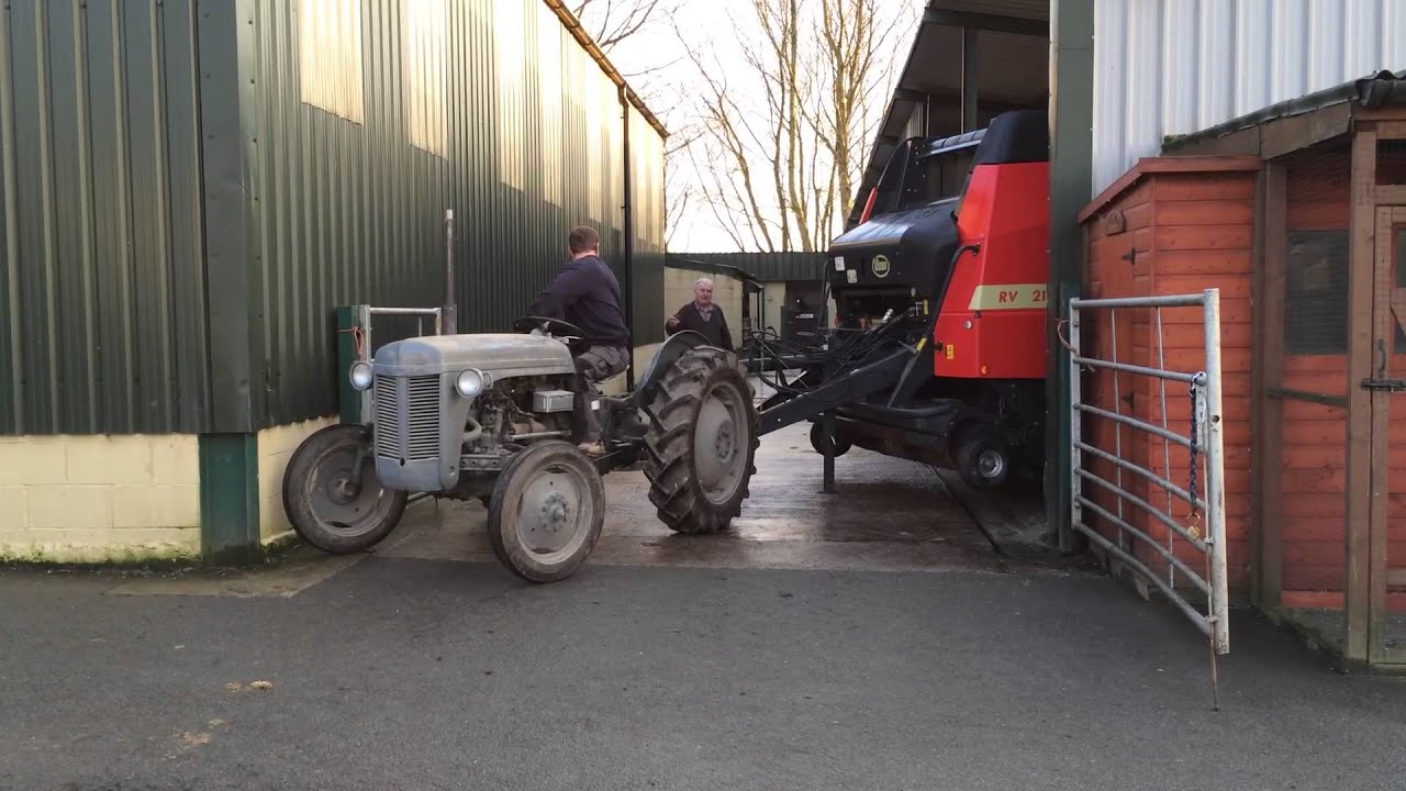 Storing New Baler With Gray Ferguson