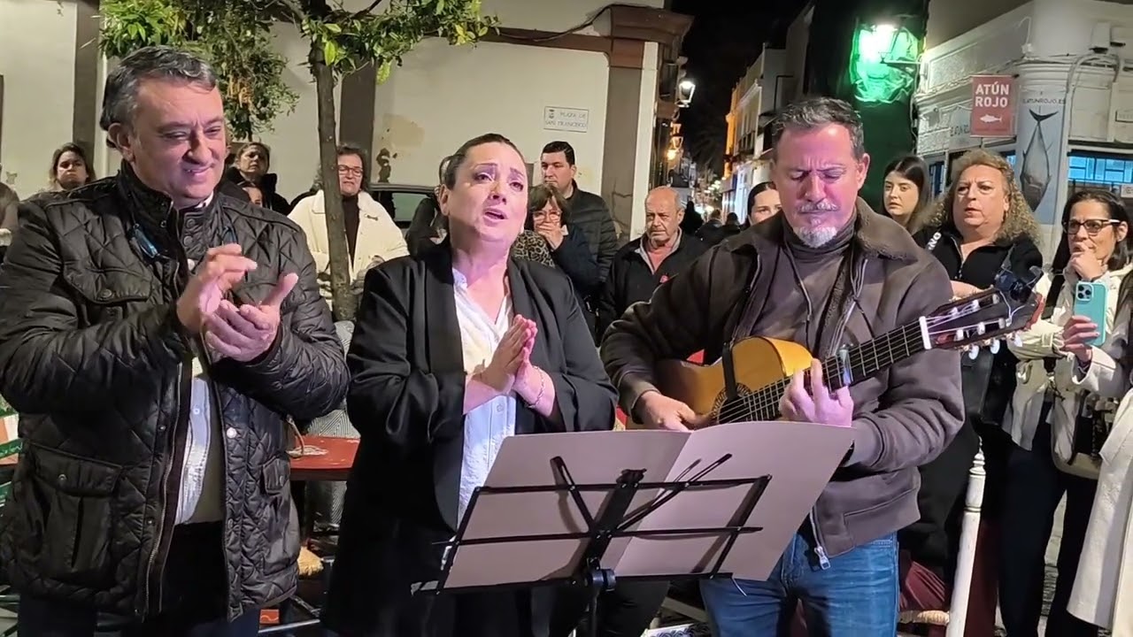 Gema y Tomás Abreu, cantan al Simpecado de Isla Cristina con José Antonio Monclova a la guitarra.