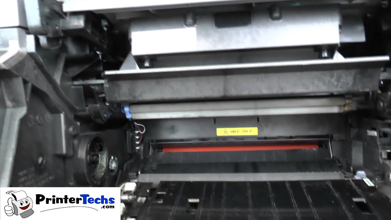 Lexmark T650 series: Removing and installing the transfer roller and charger roller