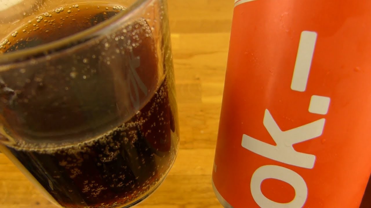 Ok.- Cola