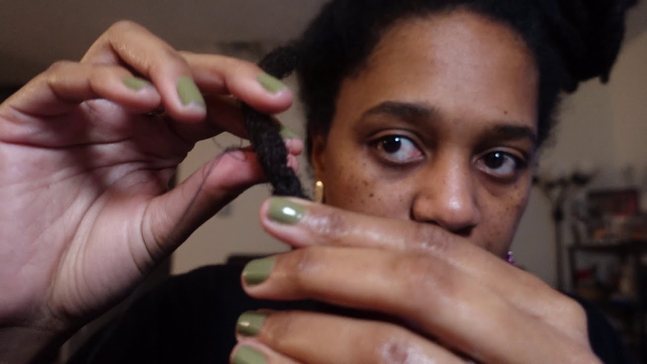 Combining locs sewing using needle and thread