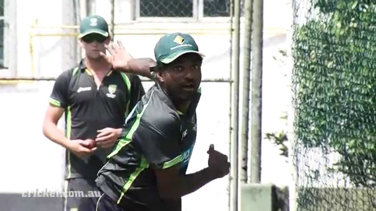 Murali puts on the Aussie shirt