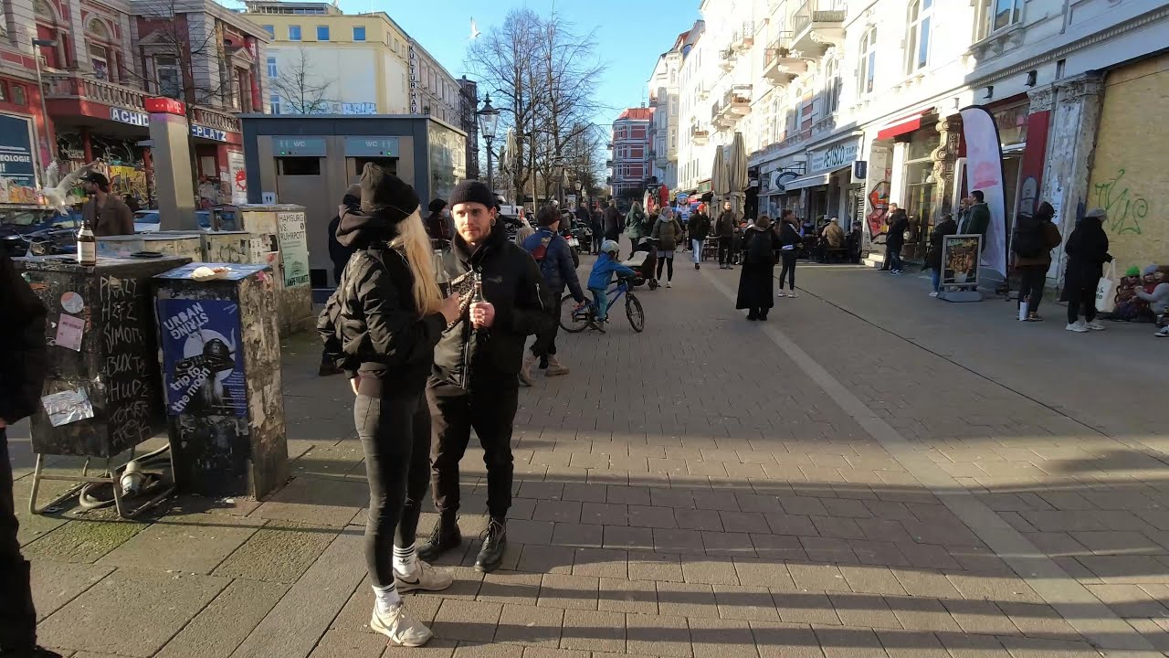 Afternoon walk in Schanzenviertel, Hamburg Germany, relaxed tour with big city sounds in late winter