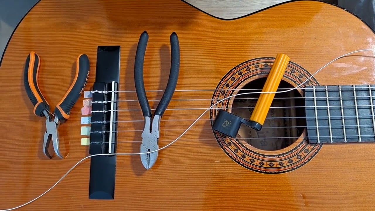 Cómo cambiar una cuerda de guitarra