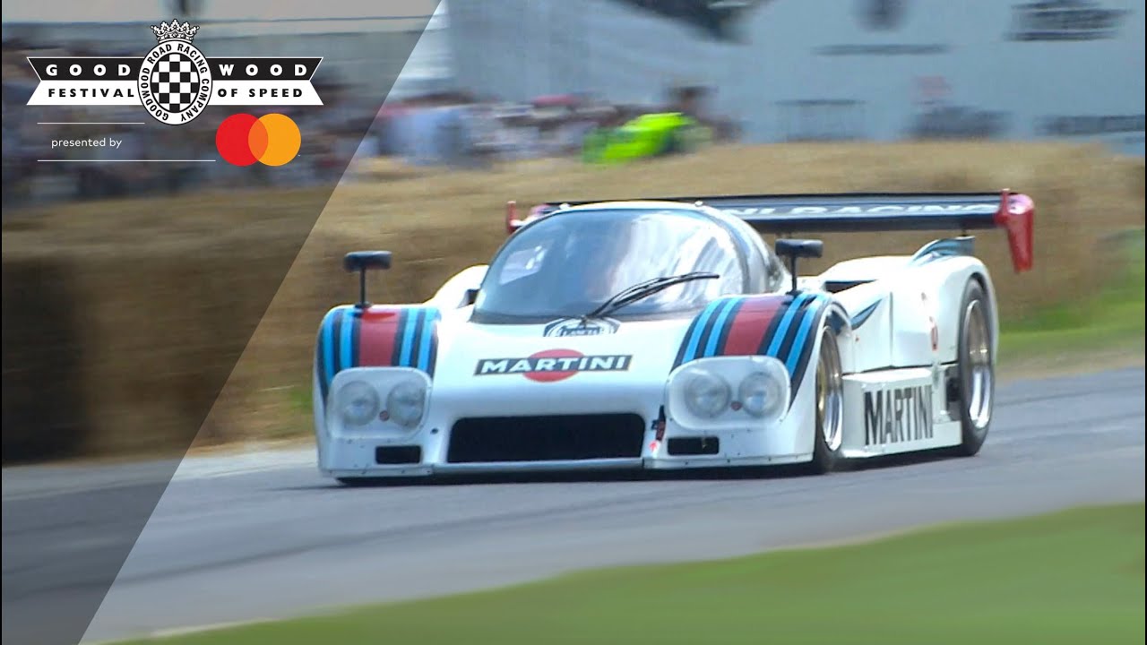 Awesome Lancia LC2 Group C monster attacks Goodwood Hill