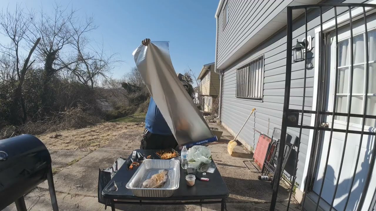 Steam roast fish over wood fire