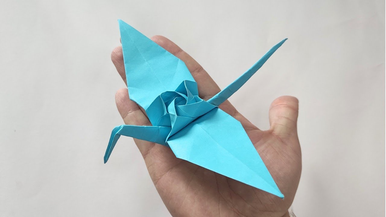 Origami CRANE with ROSE by Satoshi Kamiya | Paper crane