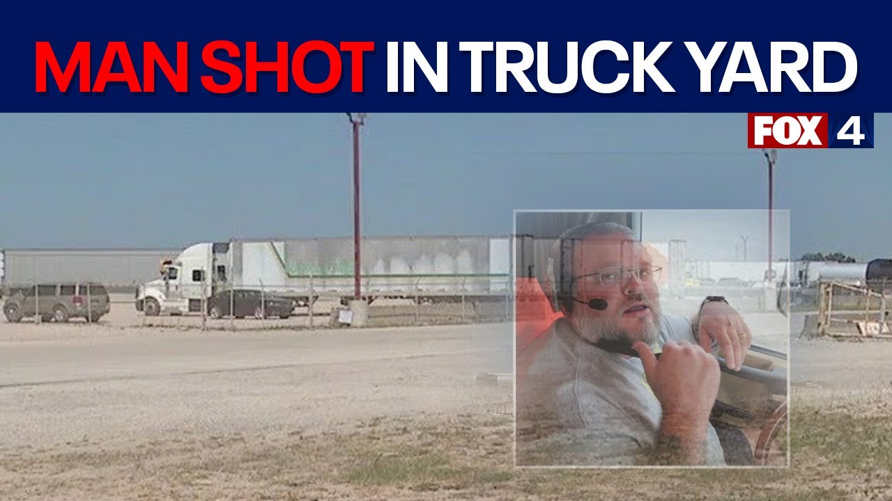 Murder suspect barricades herself in cab of semi-truck