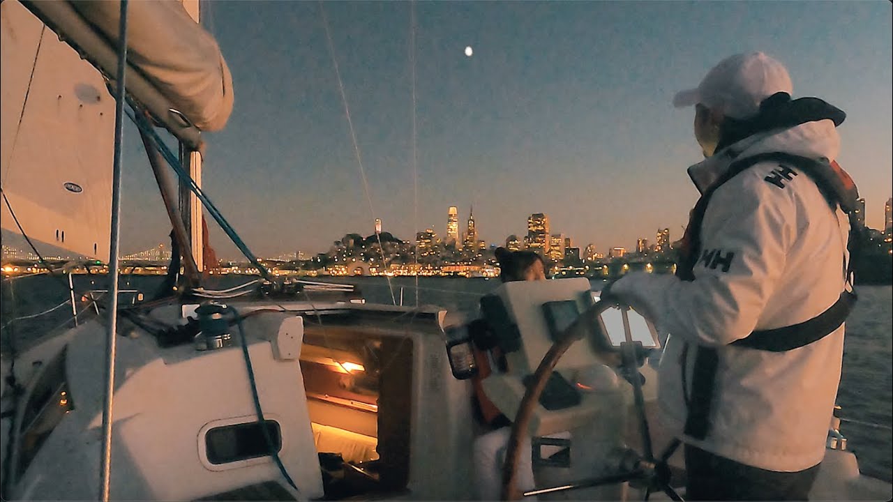 Evening Sailing in San Francisco Bay with Sunset and City Lights