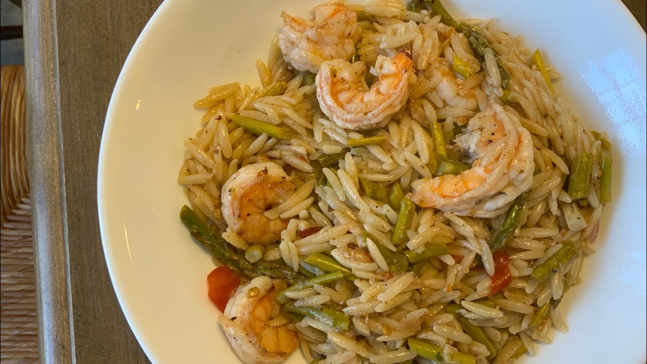 Restaurant quality shrimp with orzo. With Fresh asparagus in a garlic lemon wine sauce.