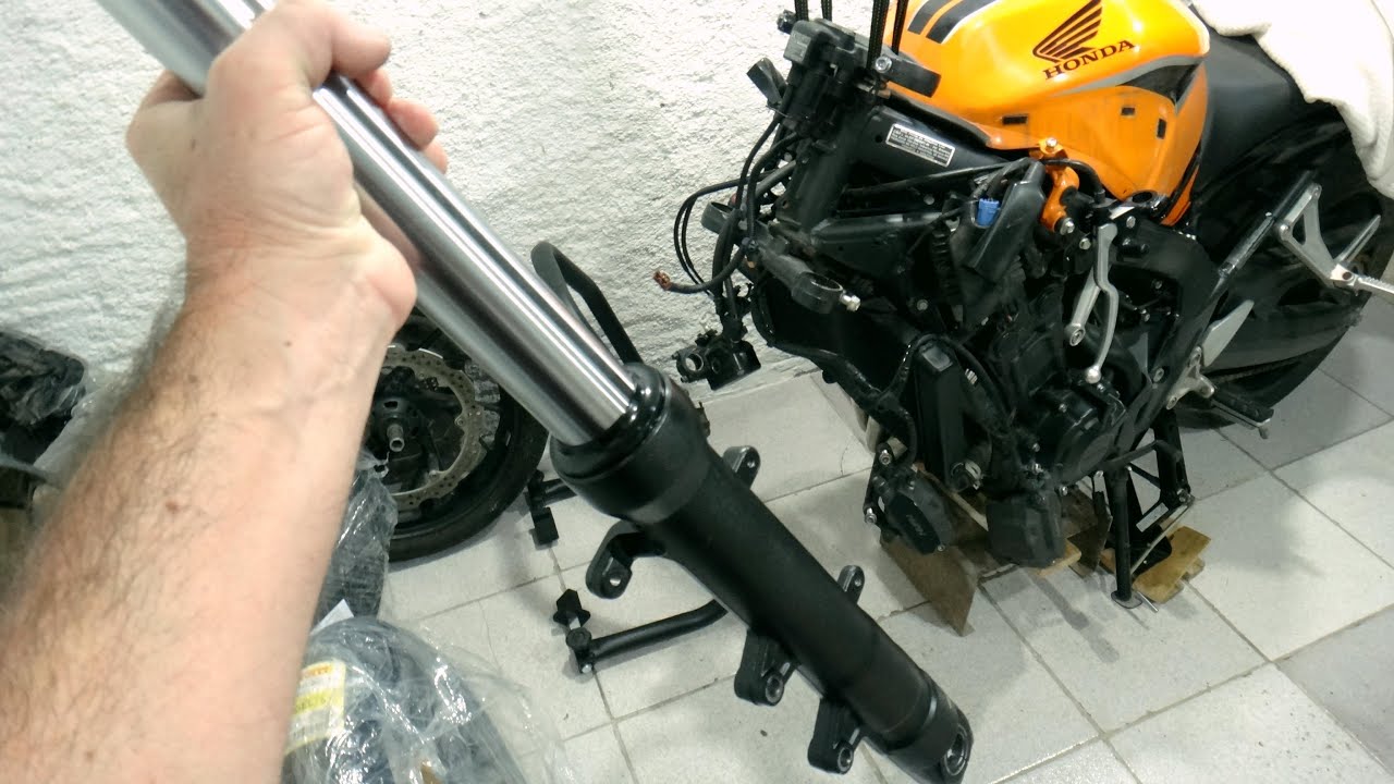 Como trocar óleo retentor e tubo interno suspenção CB 650 , CBR 650
