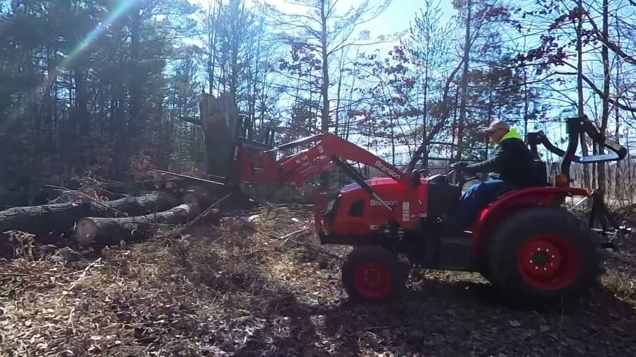 Moving Pine Logs With the Branson 2515H