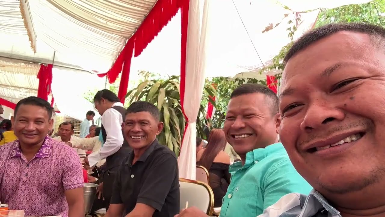 On my way to a Khmer wedding reception in Palang Village with my brother!
