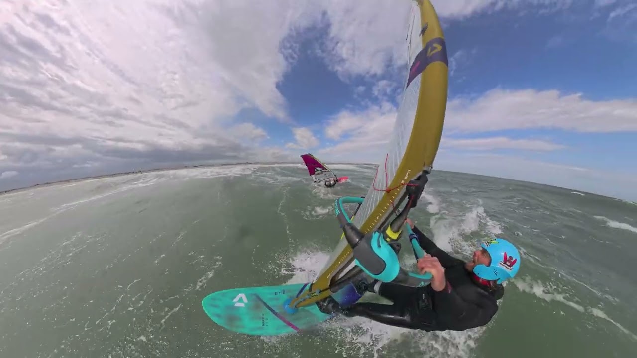 Wave windsurf session in spot of Pont des Basses. Canet en Roussillon. South France.