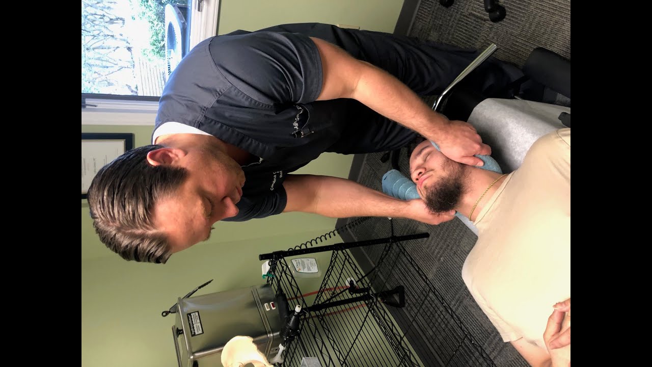 Chiropractor Raleigh North Carolina | Loud Neck And Foot Adjustment at Carolina ChiroCare and Rehab