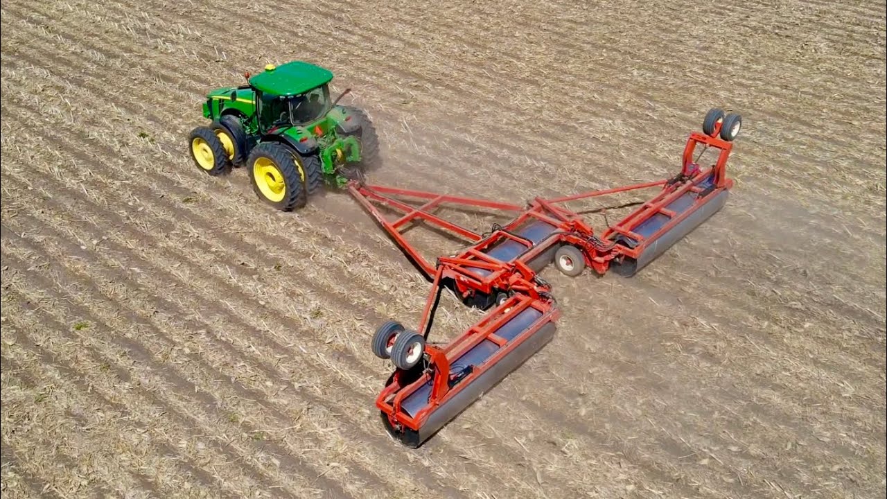 Rolling beans with a Rite Way land roller.