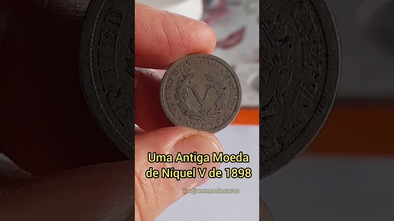 Uma antiga moeda de n&iacute;quel V de 1898