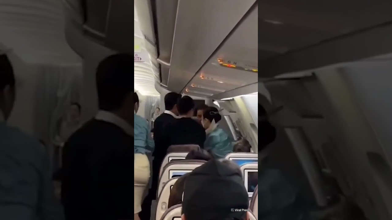 Man tries to OPEN emergency exit mid-flight