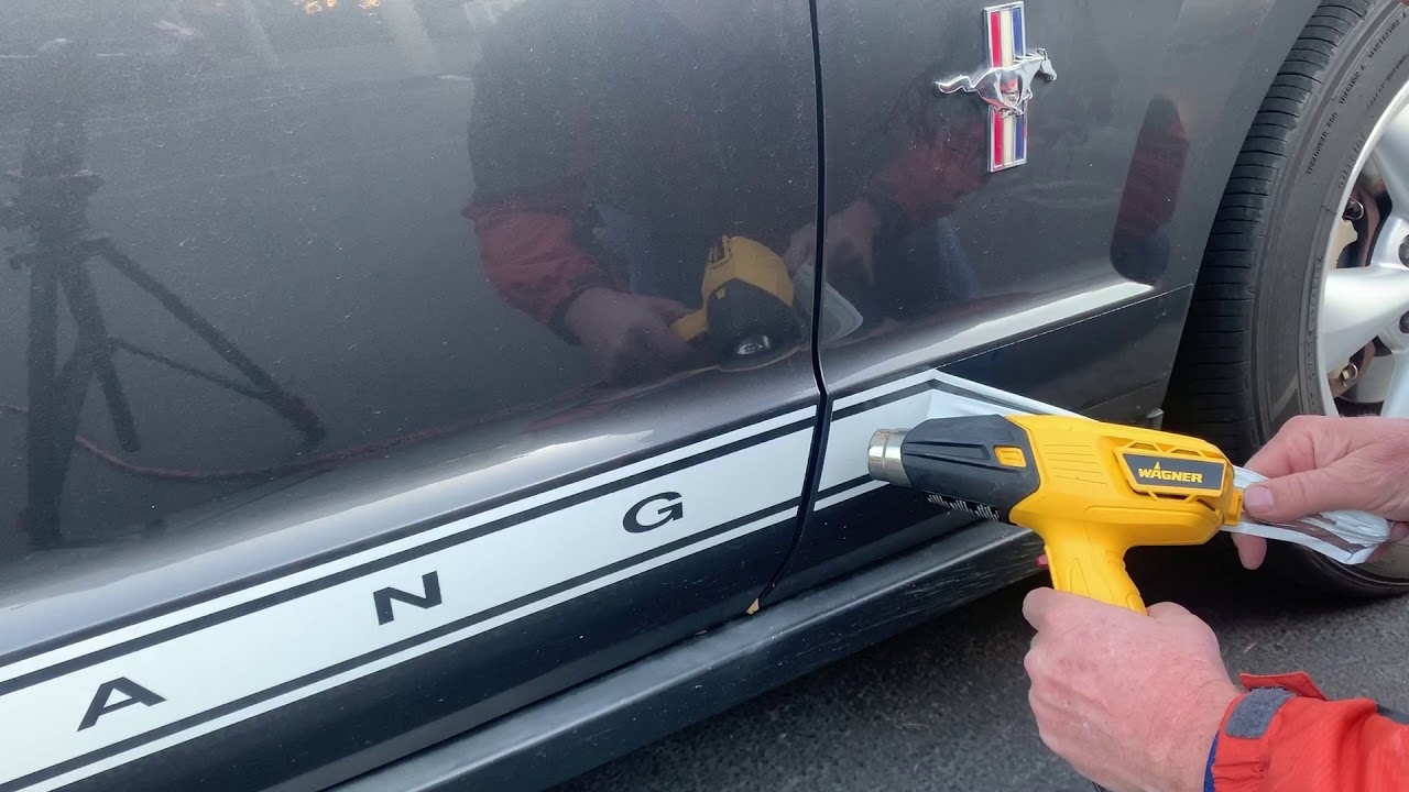 How to  Remove Vinyl Stripes and vinyl graphics using heat gun