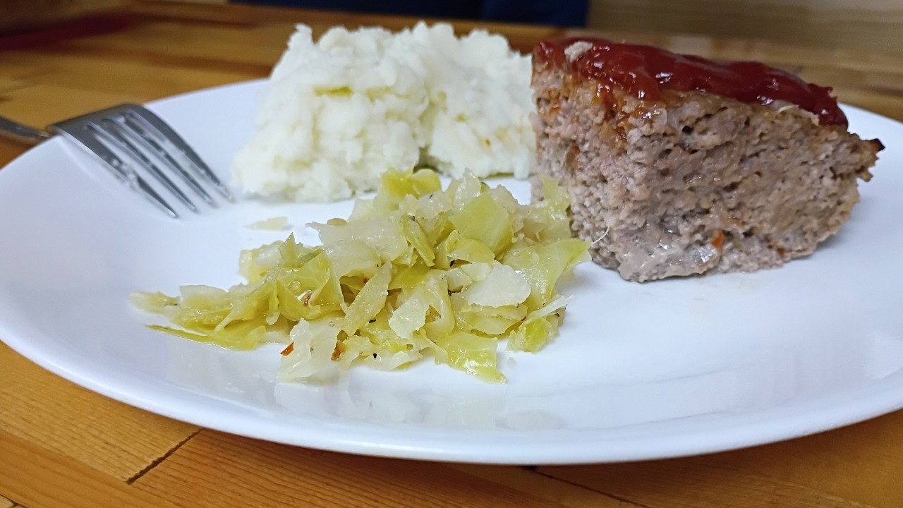 We Have Meatloaf for Dinner, with mash potatoes and cabbage.