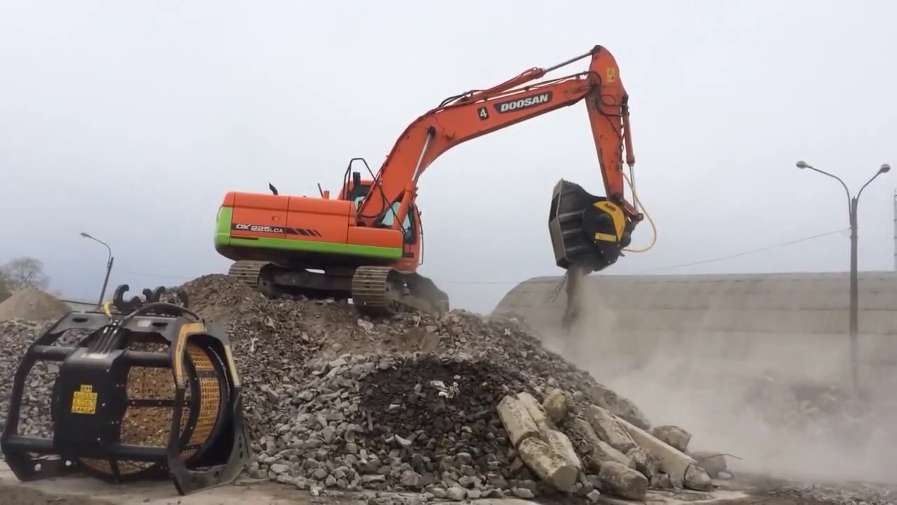 MB Crusher Bucket BF80.3 Takes On Concrete Pillar