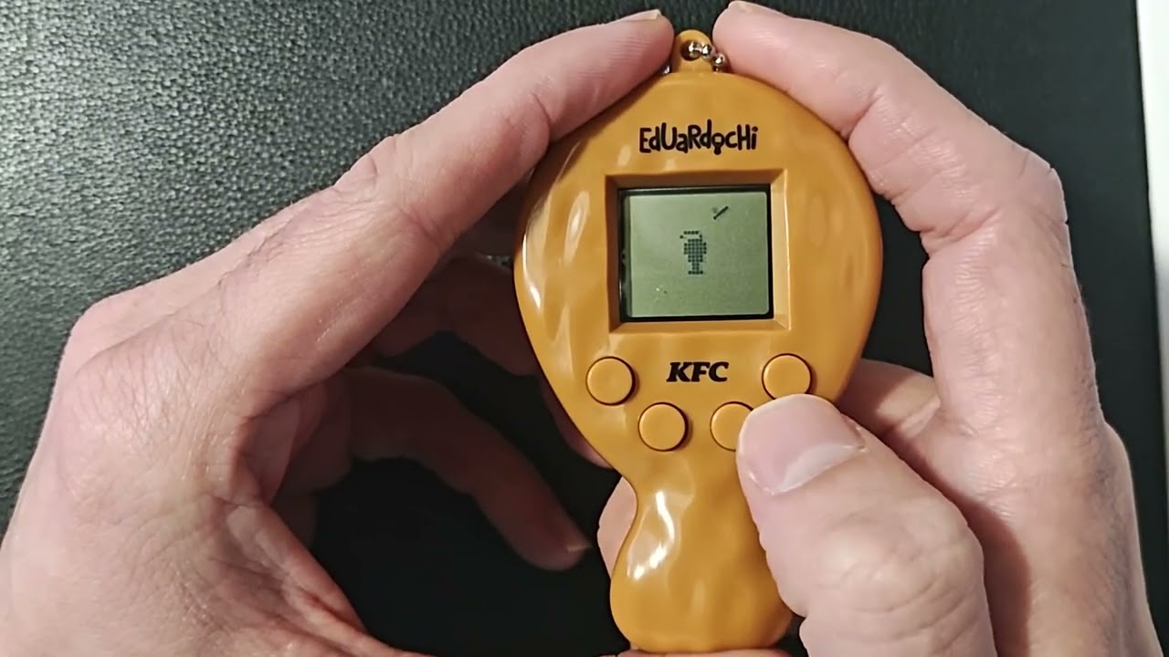 la locura del kfc un tamagotchi llamado eduardochi!!