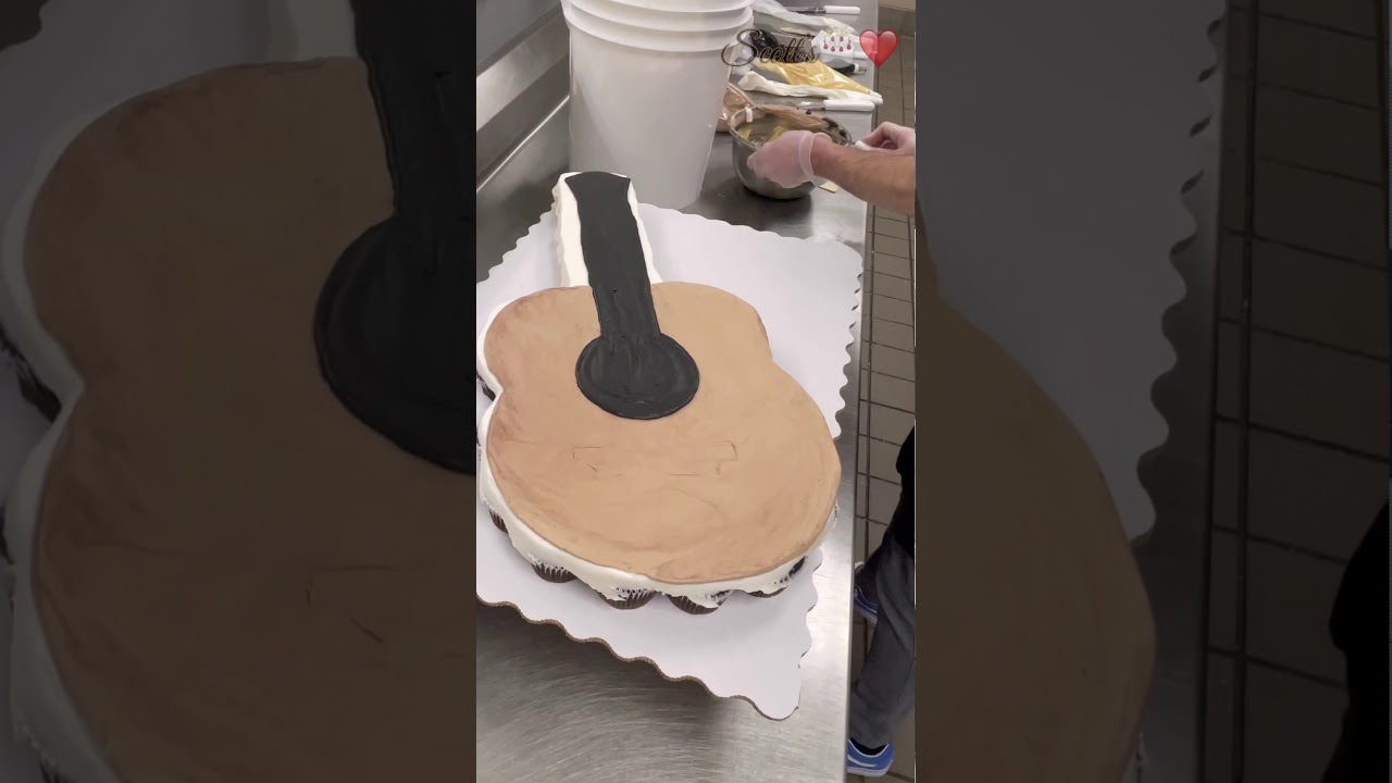 Guitar cupcake cake