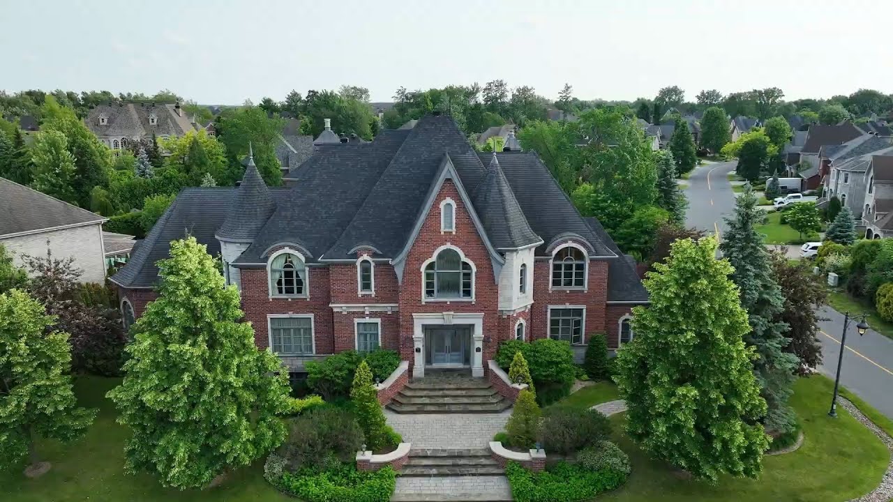 European-Inspired Luxury in Candiac | Indoor Pool, Private Garden, and 5 Bedroom