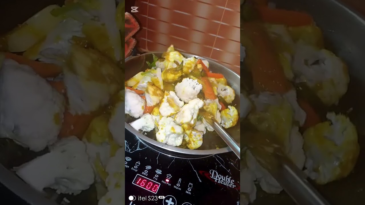 ফুল কপি আর তেলাপিয়া মাছ রান্না। 