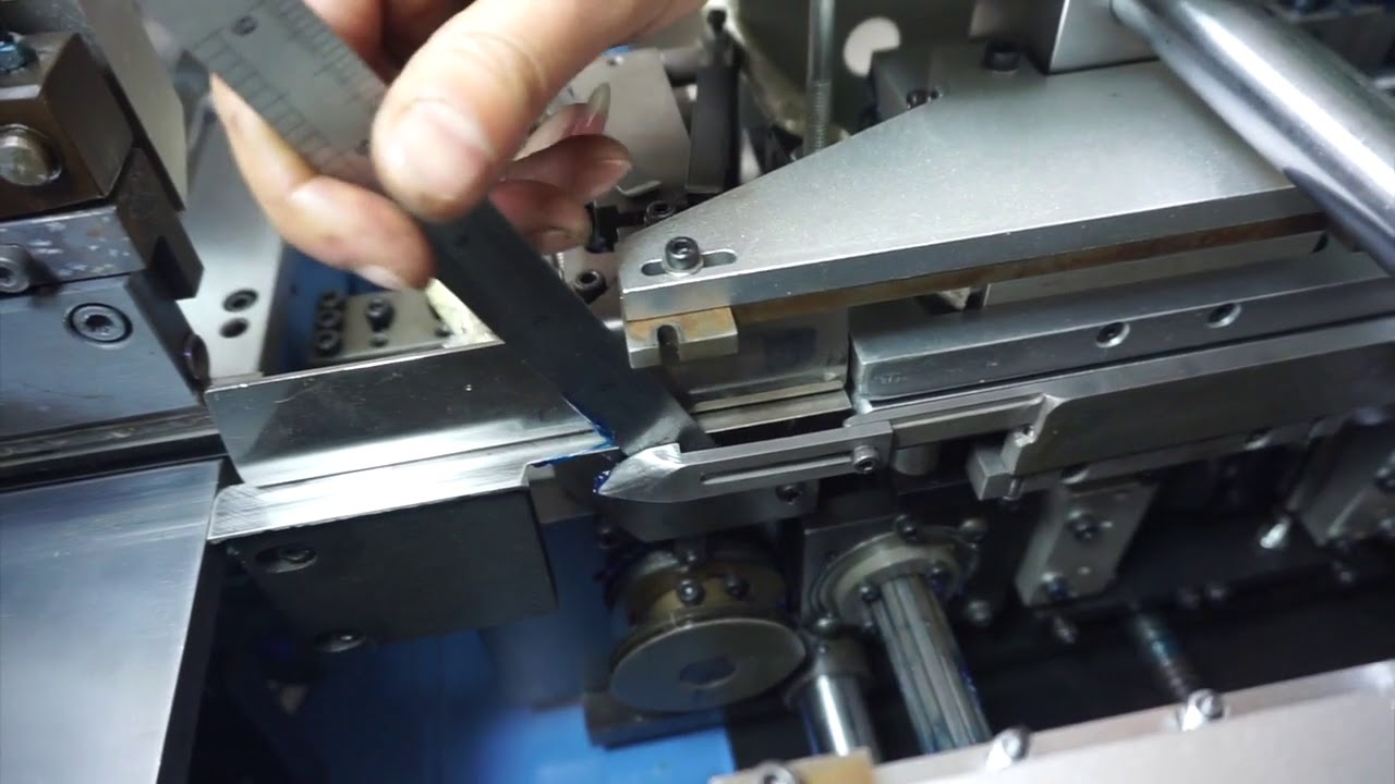 Garment Label Cutting and Folding Machine tool exchange Method - End fold to centre fold