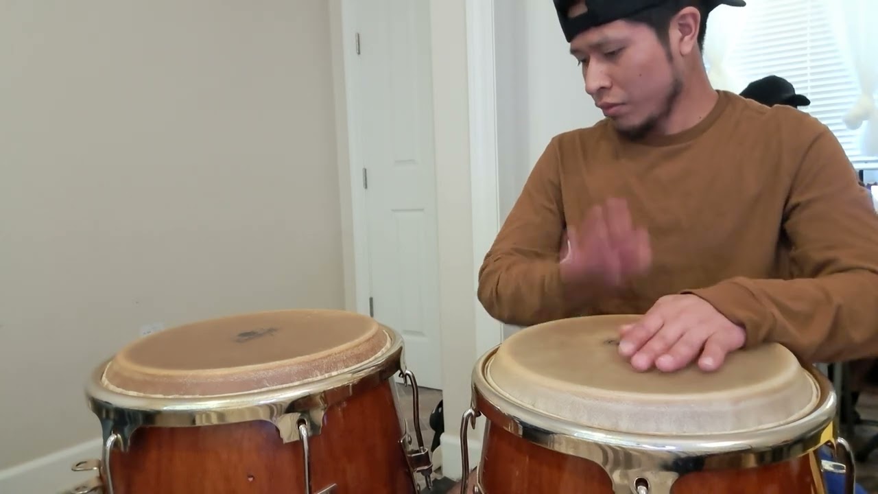 como tocar conga en merengue