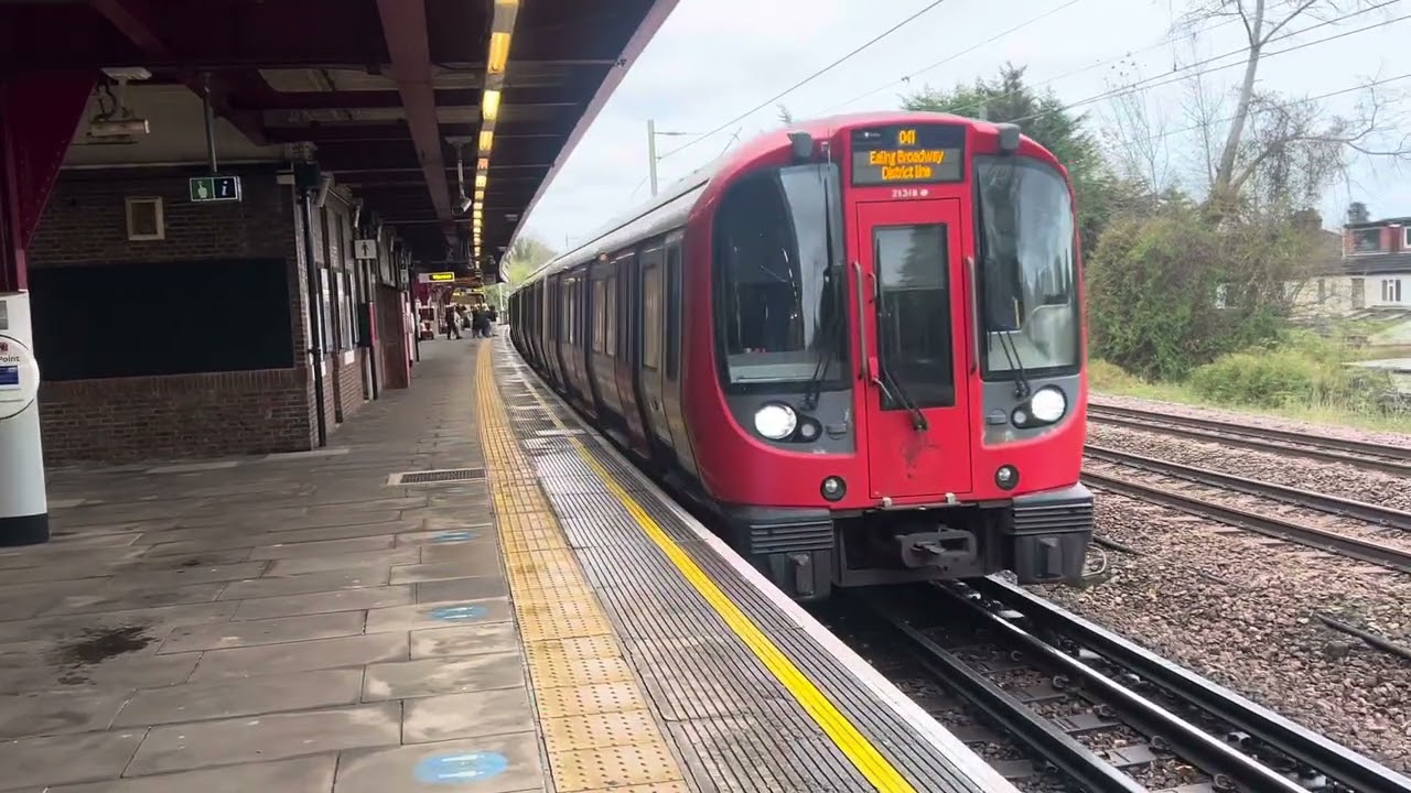 Trains at Upminster and Upminster Bridge 