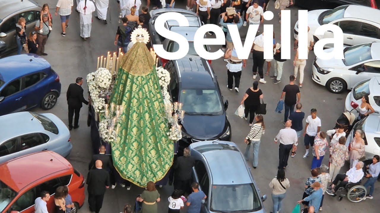 Watching this weekend street parade on our balcony, Seville Spain
