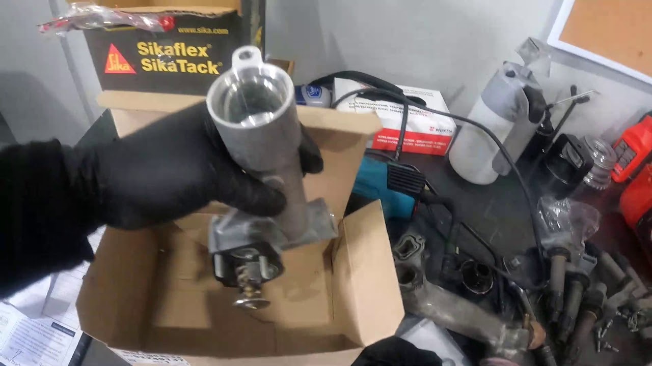 HOLDEN COMMODORE (REPLACED THERMOSTAT W/ HOUSING, SPARK PLUGS & COIL)