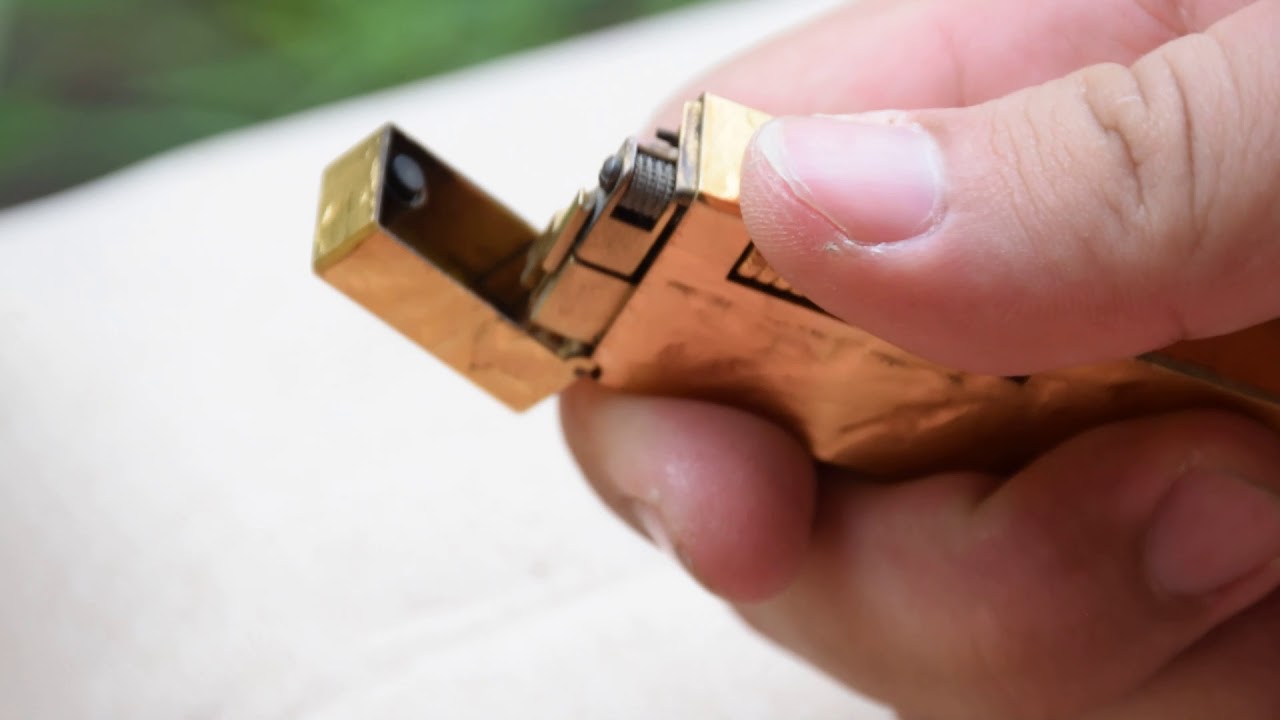 Refilling a Dunhill Roll-a-gas Lighter
